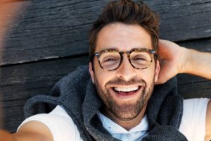 Laughing guy in glasses